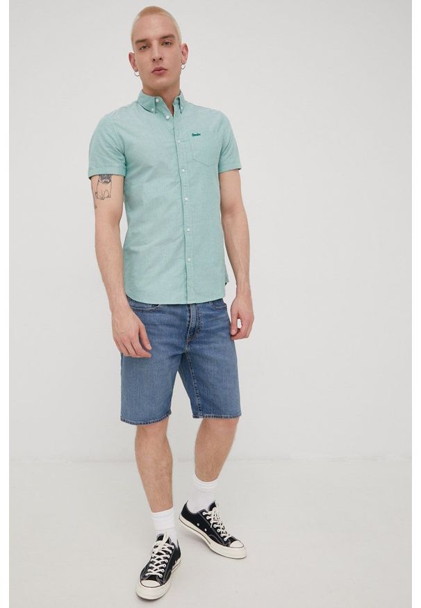 Superdry koszula bawełniana męska kolor zielony regular z kołnierzykiem button-down. Typ kołnierza: button down. Kolor: zielony. Materiał: bawełna. Długość rękawa: krótki rękaw. Długość: krótkie