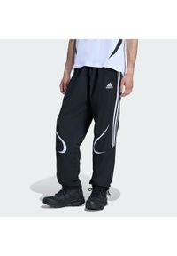 Adidas - adidas Spodnie dresowe adicolor Teamgeist KD5863 Czarny Loose Fit. Kolor: czarny. Materiał: syntetyk #1
