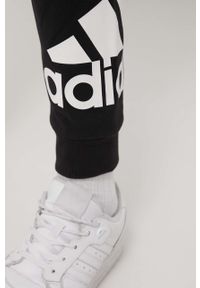 Adidas - adidas spodnie HE1824 męskie kolor czarny z nadrukiem. Kolor: czarny. Materiał: bawełna, poliester, materiał. Wzór: nadruk #3