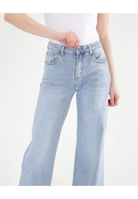 Unisono - Elastyczne jasne jeansy. Materiał: jeans. Długość: długie. Styl: klasyczny