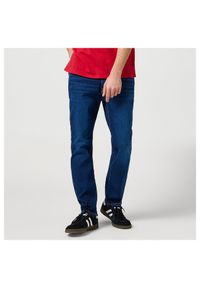 Wrangler - WRANGLER MĘSKIE SPODNIE JEANSOWE WRANGLER LARSTON VINTAGE STORM 112368466. Styl: vintage