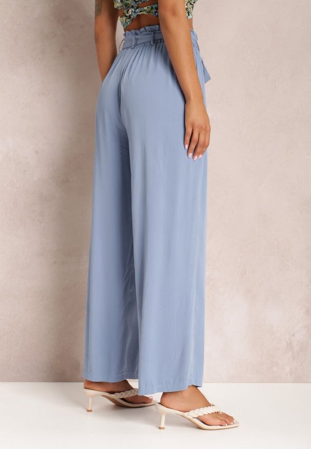 Renee - Niebieskie Spodnie Szerokie Phiorephis. Kolor: niebieski. Materiał: tkanina, materiał, wiskoza. Długość: długie. Wzór: gładki, kwiaty