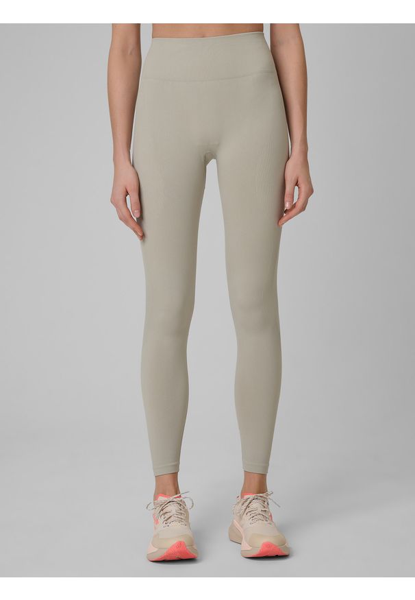 4f - 4F Legginsy treningowe bezszwowe damskie - beżowe XL/XXL. Stan: podwyższony. Kolor: beżowy. Materiał: dzianina, elastan, włókno, syntetyk, materiał. Długość: długie. Wzór: gładki. Sport: fitness