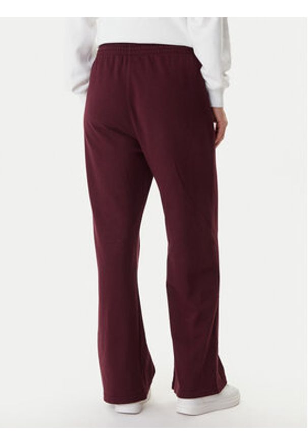 TOMMY HILFIGER - Tommy Hilfiger Spodnie dresowe UW0UW06081 Bordowy Wide Leg. Kolor: czerwony. Materiał: bawełna