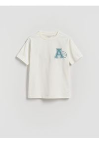 Reserved - Bawełniany t-shirt z nadrukiem - złamana biel. Materiał: bawełna. Wzór: nadruk