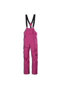 Damskie spodnie narciarskie na szelkach Helly Hansen Powderqueen. Kolor: różowy. Sezon: zima. Sport: narciarstwo #1