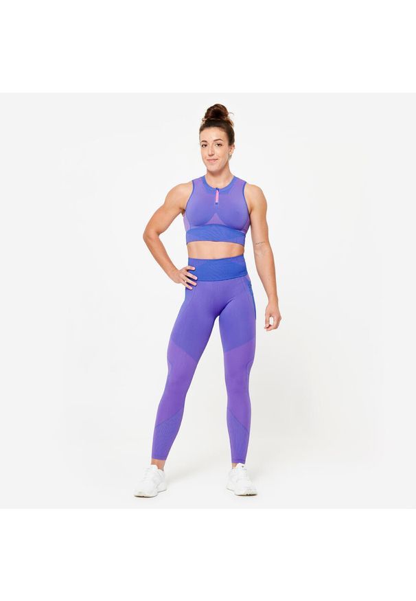 DOMYOS - Koszulka fitness damska Domyos crop top bez rękawów. Kolor: niebieski, różowy, wielokolorowy. Materiał: poliamid, elastan, materiał, poliester. Długość rękawa: bez rękawów. Sport: fitness