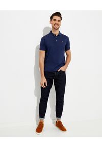 Ralph Lauren - RALPH LAUREN - Niebieska koszulka polo Slim Fit z kolorowym logo. Typ kołnierza: polo. Kolor: niebieski. Materiał: jeans, bawełna. Wzór: kolorowy #4
