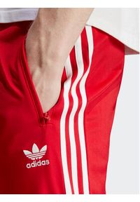 Adidas - adidas Spodnie dresowe adicolor Classics Firebird IJ7057 Czerwony Regular Fit. Kolor: czerwony. Materiał: syntetyk #5