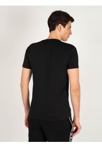 Iceberg T-shirt | ICE1UTS02 | Mężczyzna | Czarny. Typ kołnierza: dekolt w kształcie V. Kolor: czarny. Materiał: bawełna, elastan. Wzór: nadruk
