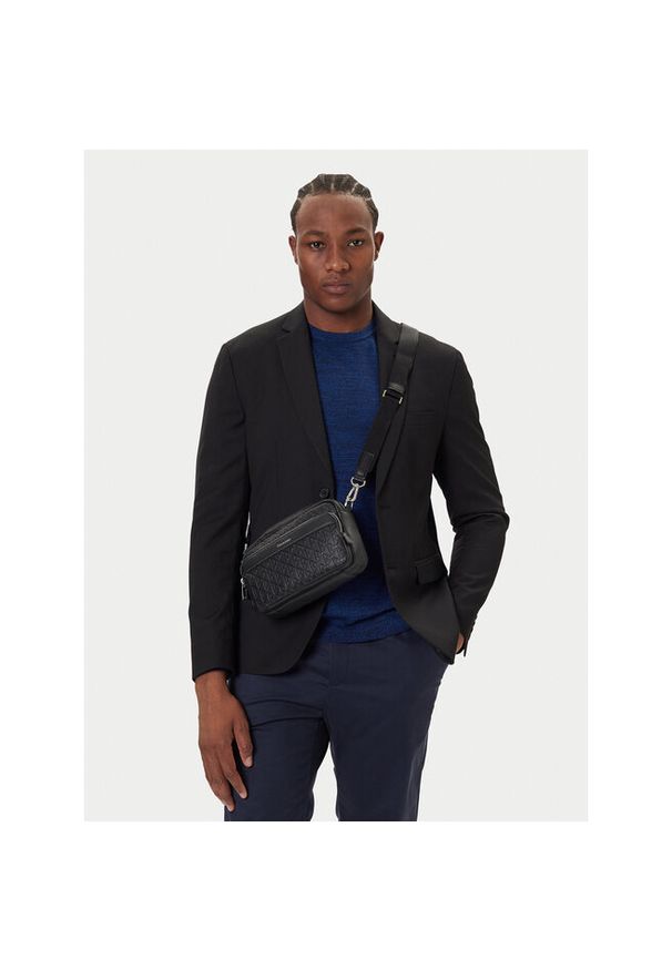 Saszetka Calvin Klein. Kolor: czarny