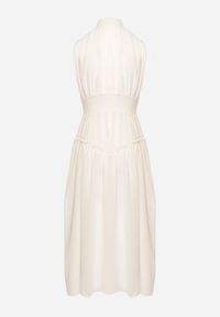 Born2be - Jasnobeżowa Sukienka Długa Rozkloszowana z Powlekanymi Guzikami Ingridesa. Kolor: beżowy. Długość: maxi #4