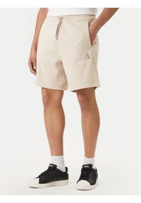 Adidas - adidas Szorty sportowe ALL SZN KC3164 Beżowy Regular Fit. Kolor: beżowy. Materiał: syntetyk. Styl: sportowy #1