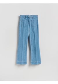 Reserved - Jeansy flare - niebieski. Kolor: niebieski