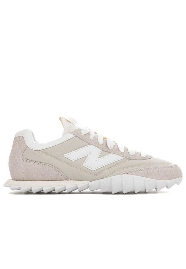 Buty New Balance URC30ET - białe. Kolor: biały. Materiał: guma, skóra, zamsz, materiał, syntetyk. Szerokość cholewki: normalna. Sezon: lato