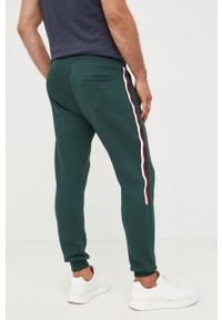 TOMMY HILFIGER - Tommy Hilfiger spodnie dresowe męskie kolor zielony z aplikacją. Kolor: zielony. Materiał: dresówka. Wzór: aplikacja #3