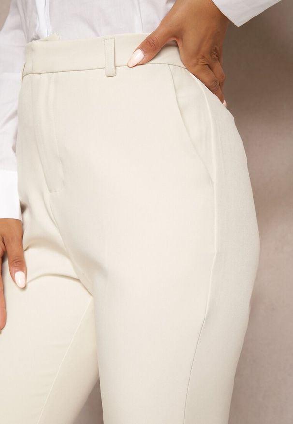 Renee - Beżowe Spodnie Dzwony High Waist z Imitacją Kieszeni Semirlla. Stan: podwyższony. Kolor: beżowy. Styl: klasyczny