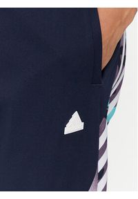 Adidas - adidas Spodnie dresowe Future Icons Allover Print IJ8853 Granatowy Regular Fit. Kolor: niebieski. Materiał: syntetyk. Wzór: nadruk #6