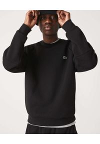 Lacoste - LACOSTE - Czarna bluza z lampasami. Kolor: czarny. Wzór: haft