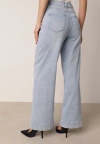 Born2be - Jasnoniebieskie Jeansy z Bawełny o Szerokim Kroju z Wysokim Stanem Senoth. Okazja: na co dzień. Stan: podwyższony. Kolor: niebieski. Styl: klasyczny, casual #6