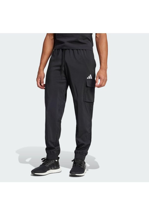 Adidas - Spodnie Essentials Small Logo Cargo. Kolor: biały, czarny, wielokolorowy. Materiał: materiał. Sport: fitness
