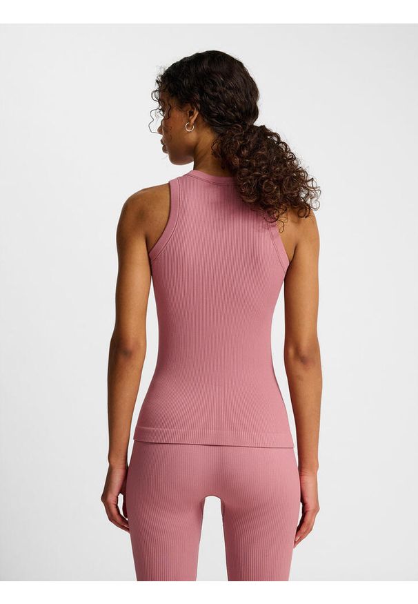 Damski bezszwowy tank top Hummel Pulse. Kolor: fioletowy. Materiał: prążkowany. Sport: fitness