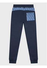 Guess Spodnie dresowe L3RQ15 JR06W Niebieski Relaxed Fit. Kolor: niebieski. Materiał: syntetyk #3