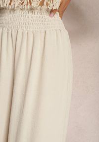 Renee - Beżowe Spodnie High Waist z Szerokimi Nogawkami i Gumką w Pasie Risabessa. Okazja: na co dzień. Stan: podwyższony. Kolor: beżowy. Styl: casual, elegancki #5