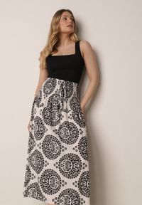 Born2be - Czarna Rozkloszowana Spódnica z Wiskozy z Wysokim Stanem i Etnicznym Wzorem Ari. Okazja: do pracy, na co dzień, na spacer. Stan: podwyższony. Kolor: czarny. Materiał: wiskoza. Wzór: aplikacja. Sezon: lato. Styl: casual #7