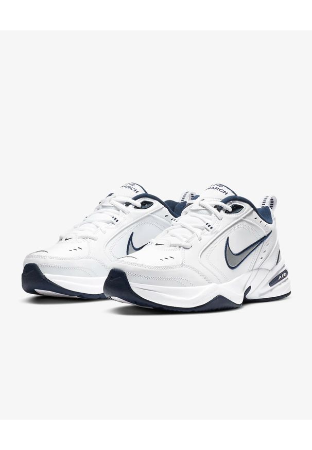 Sneakersy męskie Nike Air Monarch IV. Okazja: na co dzień. Kolor: biały. Materiał: skóra, syntetyk. Szerokość cholewki: normalna. Sport: fitness
