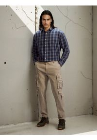 Sinsay - Spodnie cargo - beżowy. Kolor: beżowy #1