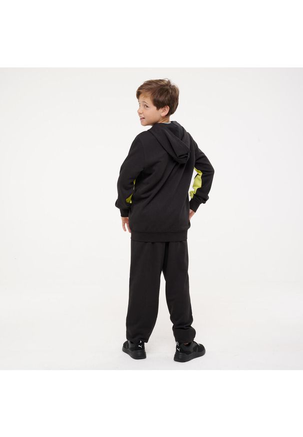 Dres dziecięcy Puma. Okazja: na uczelnię. Kolor: czarny, wielokolorowy, żółty. Materiał: dresówka. Styl: sportowy