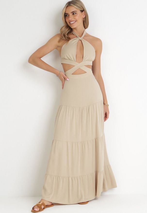 Born2be - Beżowa Rozkloszowana Sukienka z Wycięciami i Wiązaniem Abisal. Kolor: beżowy
