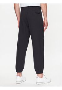 New Balance Spodnie dresowe MP23551 Czarny Relaxed Fit. Kolor: czarny. Materiał: bawełna, dresówka #4