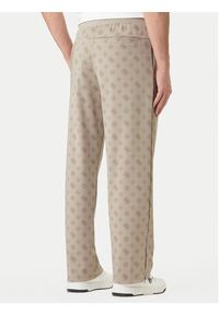 Guess Spodnie dresowe Z6GB03 K2850 Beżowy Regular Fit. Kolor: beżowy. Materiał: syntetyk #5