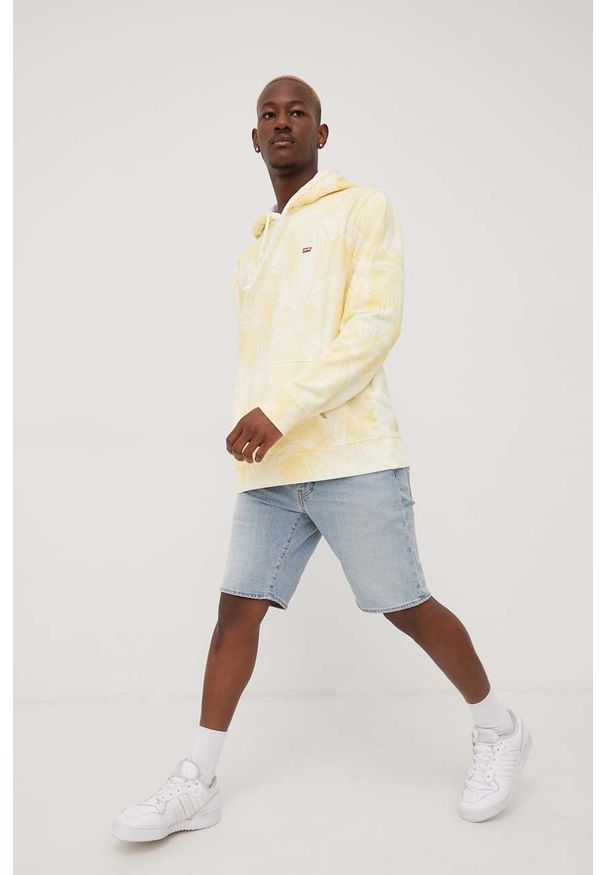 Levi's® - Levi's bluza bawełniana męska kolor żółty z kapturem wzorzysta. Okazja: na spotkanie biznesowe, na co dzień. Typ kołnierza: kaptur. Kolor: żółty. Materiał: bawełna. Wzór: aplikacja. Styl: biznesowy, casual