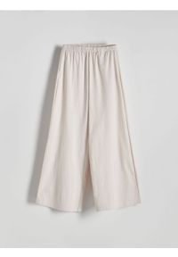 Reserved - Szerokie spodnie - kremowy. Kolor: kremowy. Materiał: dzianina