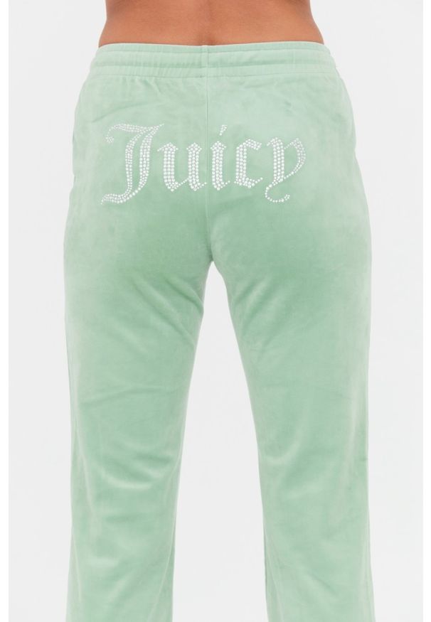 Juicy Couture - JUICY COUTURE Seledynowe spodnie dresowe Tina. Kolor: niebieski. Materiał: dresówka