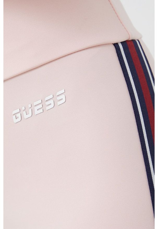 Guess Legginsy damskie kolor różowy gładkie. Kolor: różowy. Materiał: dzianina. Długość: długie. Wzór: gładki
