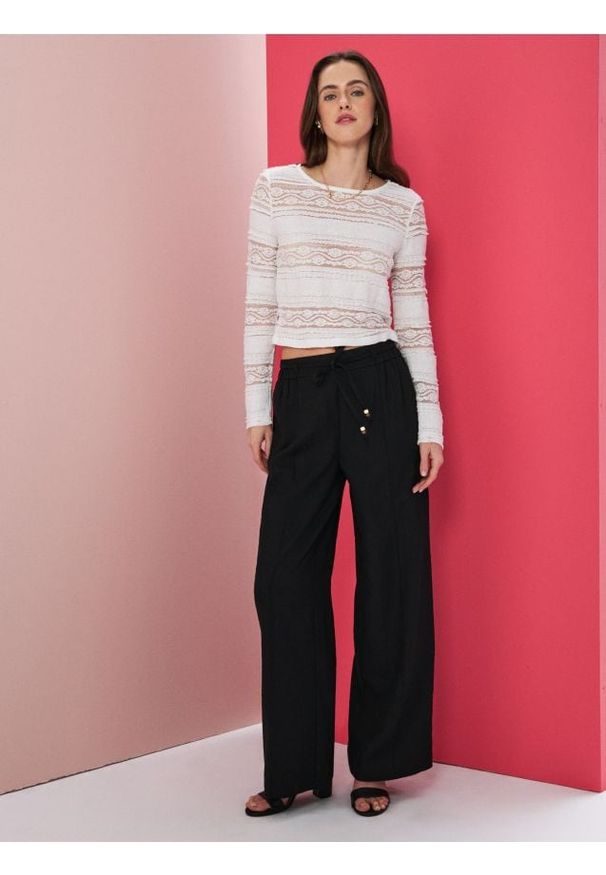 Sinsay - Spodnie palazzo z domieszką wiskozy - czarny. Kolor: czarny. Materiał: wiskoza