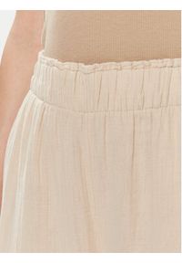 GAP - Gap Spodnie materiałowe 855967-01 Beżowy Relaxed Fit. Kolor: beżowy. Materiał: bawełna #5