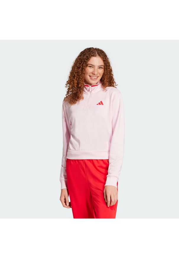 Adidas - Bluza dresowa Essentials Color Pop French Terry Crop Quarter-Zip. Kolor: różowy. Materiał: dresówka. Długość rękawa: długi rękaw. Długość: krótkie. Sport: fitness
