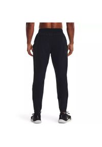 Spodnie dresowe męskie Under Armour STORM RUN PANT. Kolor: czarny. Materiał: dresówka. Sport: bieganie