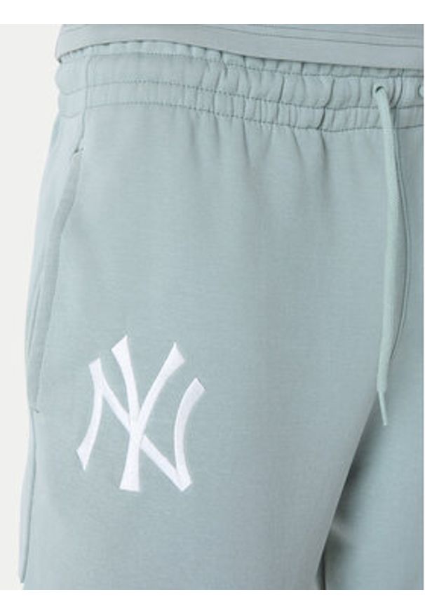 New Era Spodnie dresowe New York Yankees MLB League Essential Paste 60596182 Zielony Regular Fit. Kolor: zielony. Materiał: bawełna