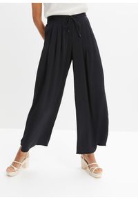 bonprix - Spodnie culotte z lejącej satyny. Kolor: czarny. Materiał: satyna #1
