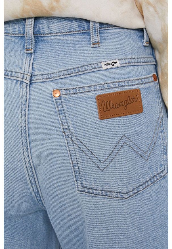 Wrangler - Jeansy Wild West. Stan: podwyższony. Kolor: niebieski