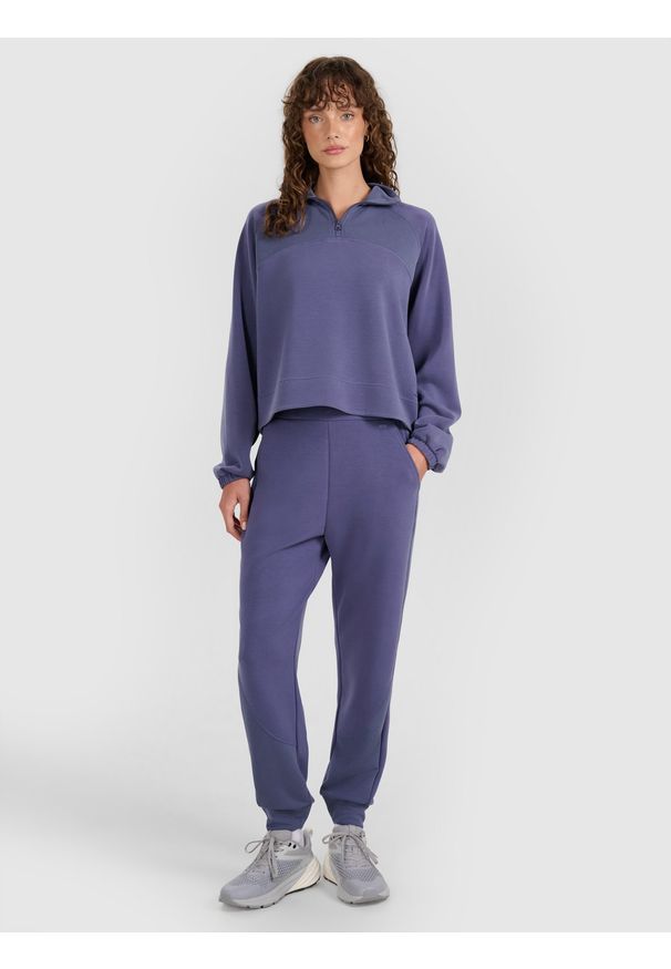 4f - 4F Spodnie dresowe joggery z modalem damskie - granatowe XXL. Kolor: niebieski. Materiał: dresówka. Wzór: gładki, ze splotem. Sport: fitness