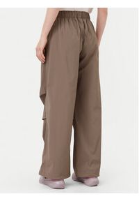 Adidas - adidas Spodnie dresowe Essentials Ripstop JD0783 Beżowy Loose Fit. Kolor: beżowy. Materiał: syntetyk #5