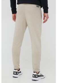 4f - 4F spodnie dresowe męskie kolor beżowy gładkie. Kolor: beżowy. Materiał: dresówka. Wzór: gładki #3