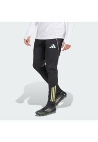 Adidas - Spodnie Juventus Tiro 25 Competition Training. Kolor: czarny. Materiał: dresówka. Sport: fitness